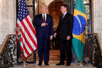 Bolsonaro, en sintonía personal y política con el multimillonario neoyorkino y actual ocupante de la Casa Blanca. REUTERS/Tom Brenner